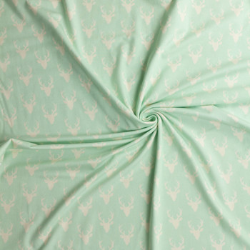 Tiny Buck Forest Mint Stretch Cotton Jersey Knit from Art Gallery Fabrics #32314 Fabric By The Yard - Wide shot