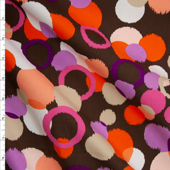 White, Orange, and Hot Pink Ikat Dots on Brown Stretch Cotton Poplin Fabric By The Yard