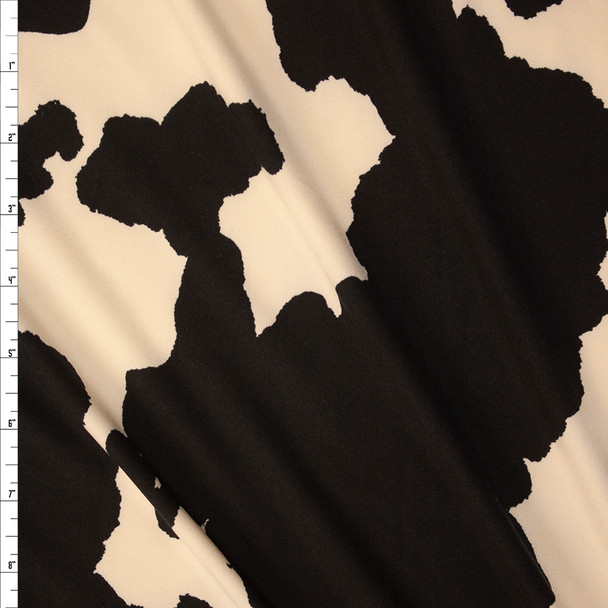 Black and Ivory Cow Print Double Brushed Poly/Spandex Fabric By The Yard