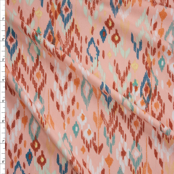 Southwestern Ikat on Peach Double Brushed Poly/Spandex Knit Fabric By The Yard