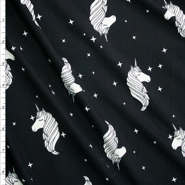 White Stars and Unicorns on Black Double Brushed Poly/Spandex Knit Fabric By The Yard