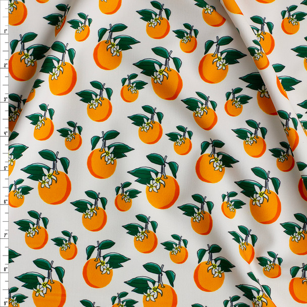 Oranges on White Nylon/Spandex Fabric By The Yard