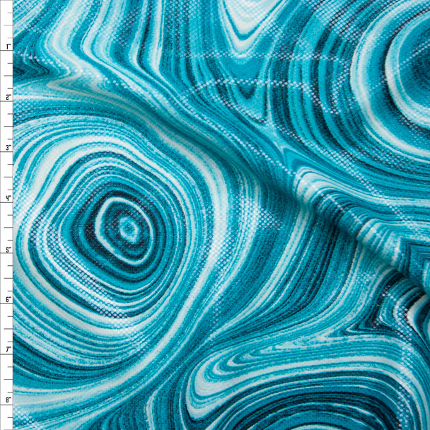 Turquoise Paint Swirl Dot Glossed Poly Knit Fabric By The Yard