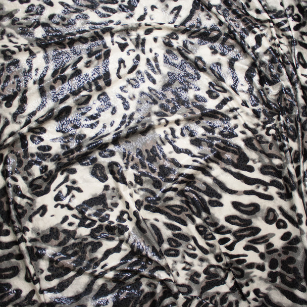 Cali Fabrics Grey and Black Leopard Print Poly Knit with Gloss Overlay ...