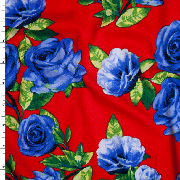 Blue Roses with Green Leaves on Bright Red Double Brushed Poly Spandex Fabric By The Yard