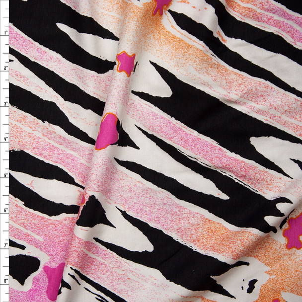 Black, Pink, Orange, and White Zebra-Ish Cotton Lycra Fabric By The Yard