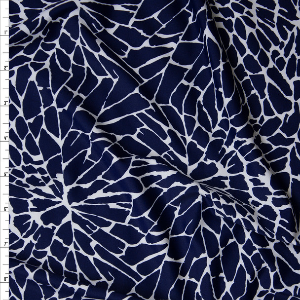 White on Navy Shattered Glass Print Nylon/Spandex Print Fabric By The Yard