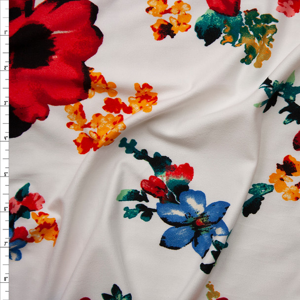 Bright Red, Blue, Green, and Yellow Floral on White Double Brushed Poly Spandex Fabric By The Yard