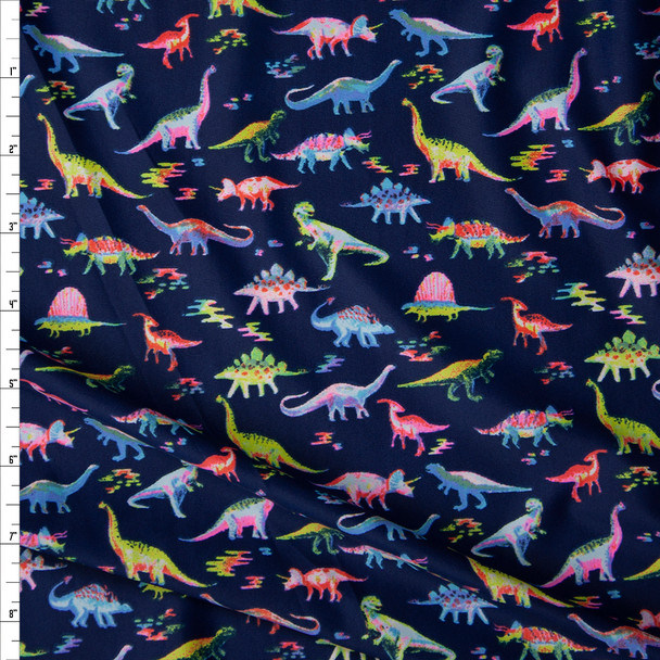 Bright Dinosaurs on Navy Blue Stretch Nylon/Lycra Knit Fabric By The Yard