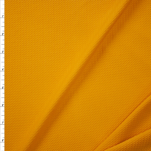 Goldenrod Solid Bullet Liverpool Knit Fabric By The Yard