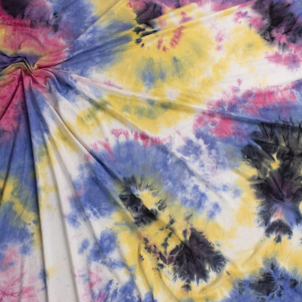 Black, Pink, Yellow, and Blue Tie Dye Double Brushed Poly/Spandex Fabric By The Yard - Wide shot