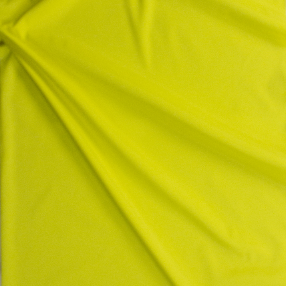 Neon Yellow Stretch Poly Lining Fabric By The Yard - Wide shot