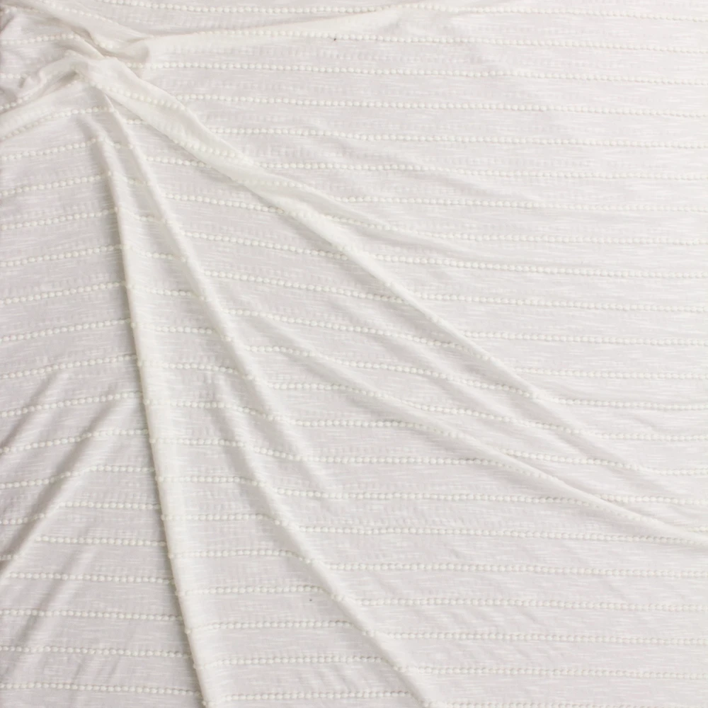 Warm White on Warm White Scalloped Mini Ruffle Jersey Knit Fabric By The Yard - Wide shot
