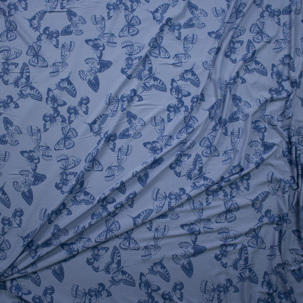 Royal Butterflies on Sky Blue Double Brushed Poly/Spandex Knit Fabric By The Yard - Wide shot
