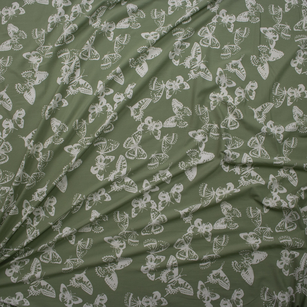 White Butterflies on Sage Green Double Brushed Poly/Spandex Knit Fabric By The Yard - Wide shot