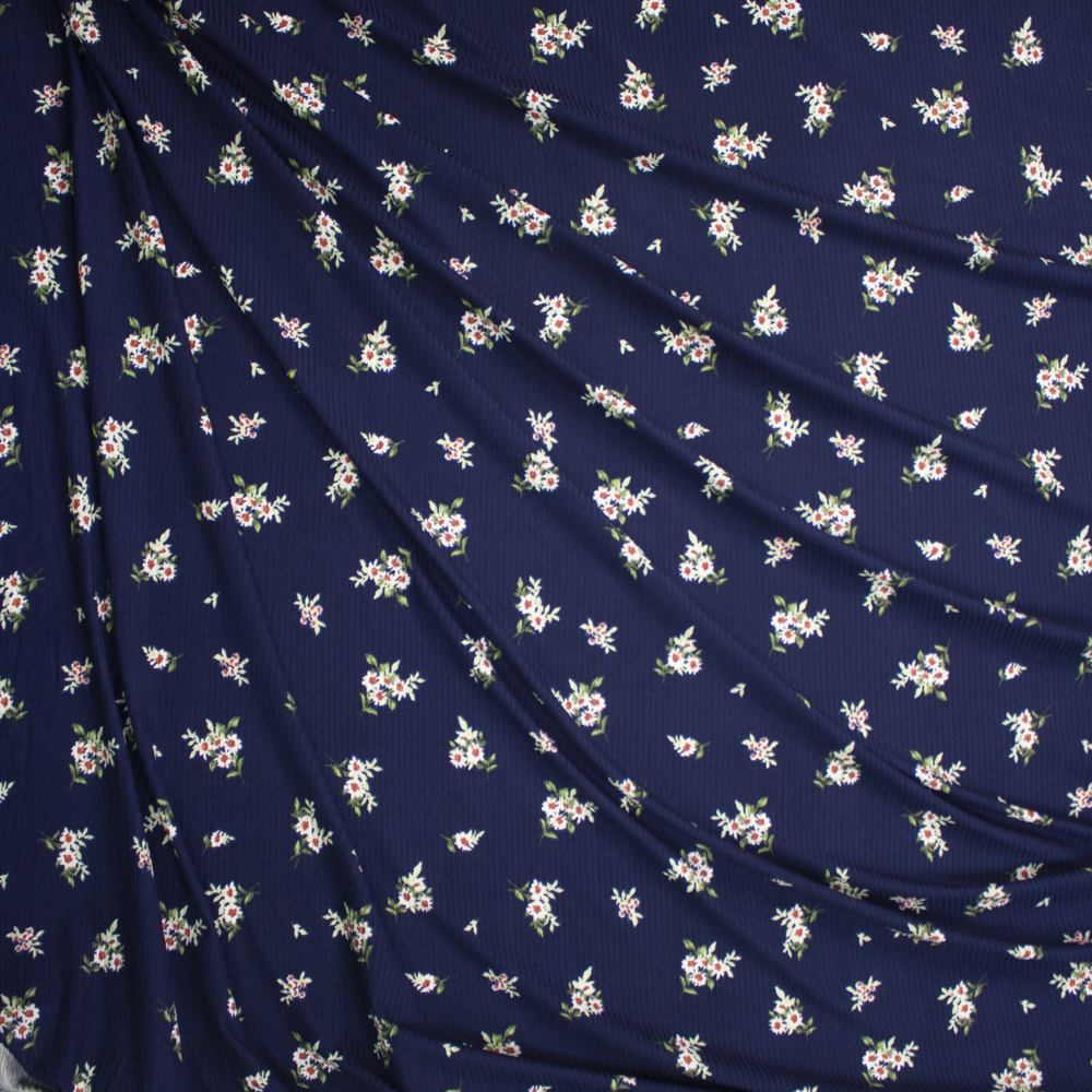 White Floral on Navy Blue Brushed Stretch Rib Knit Fabric By The Yard - Wide shot