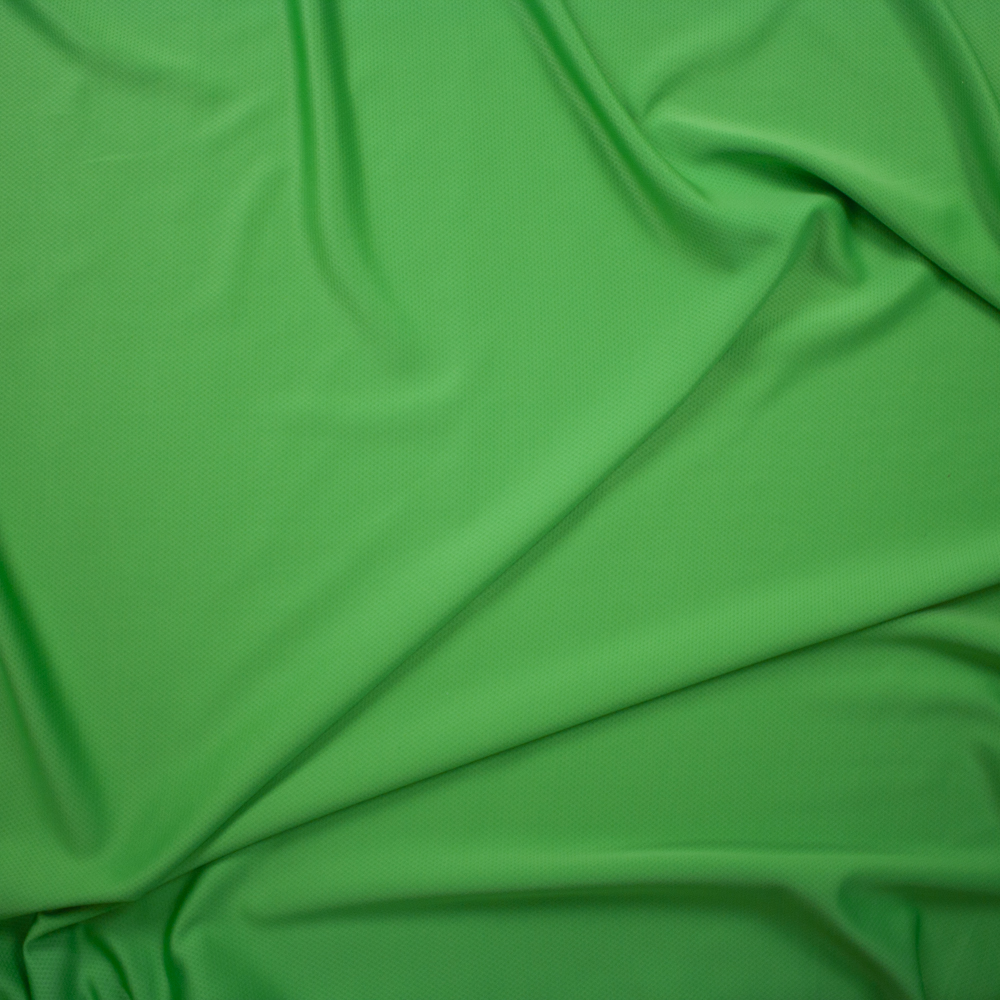 Grass Green Moisture Wicking Perforated Stretch Double Knit Fabric By The Yard - Wide shot