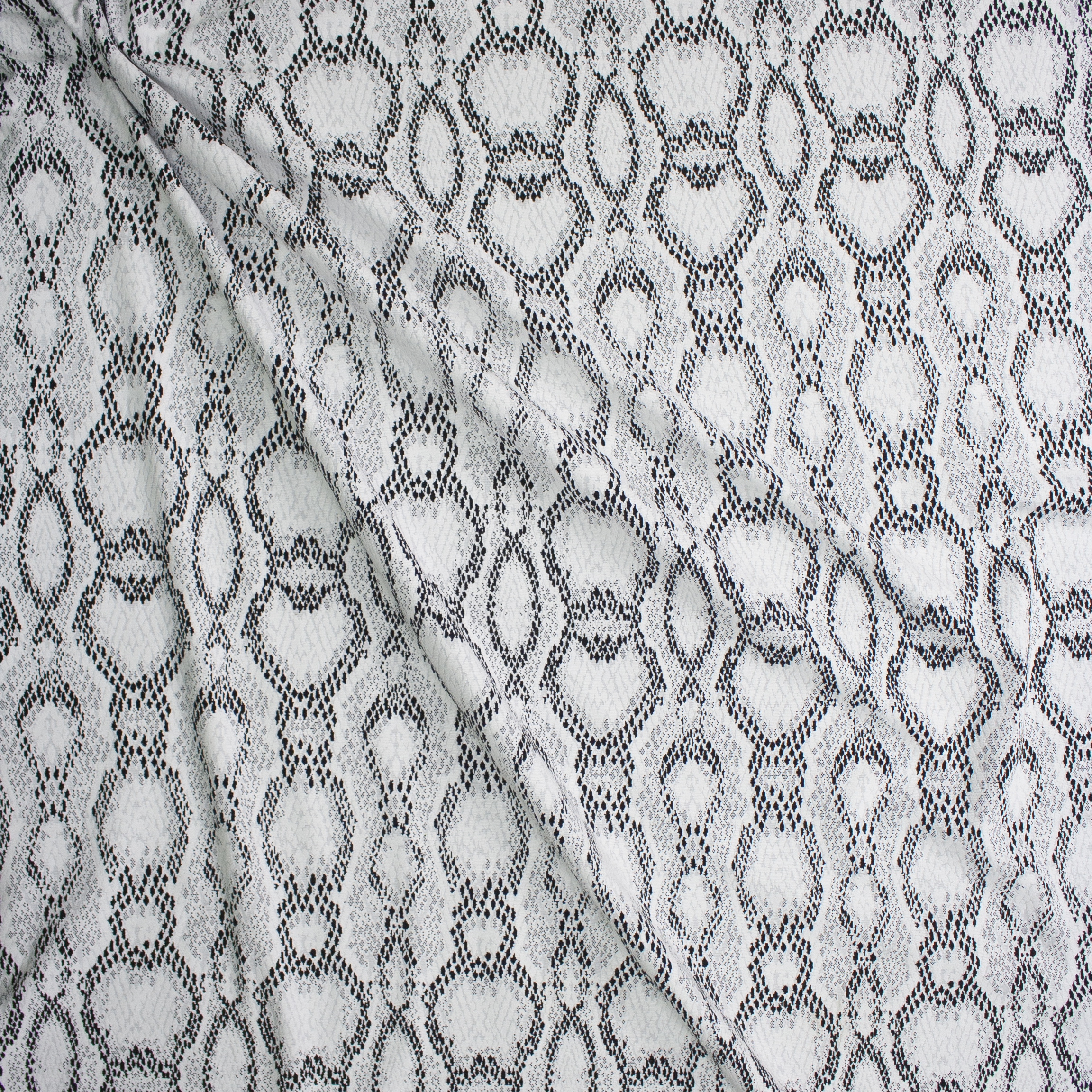 Black and White Snakeskin Textured Double Knit Fabric By The Yard - Wide shot