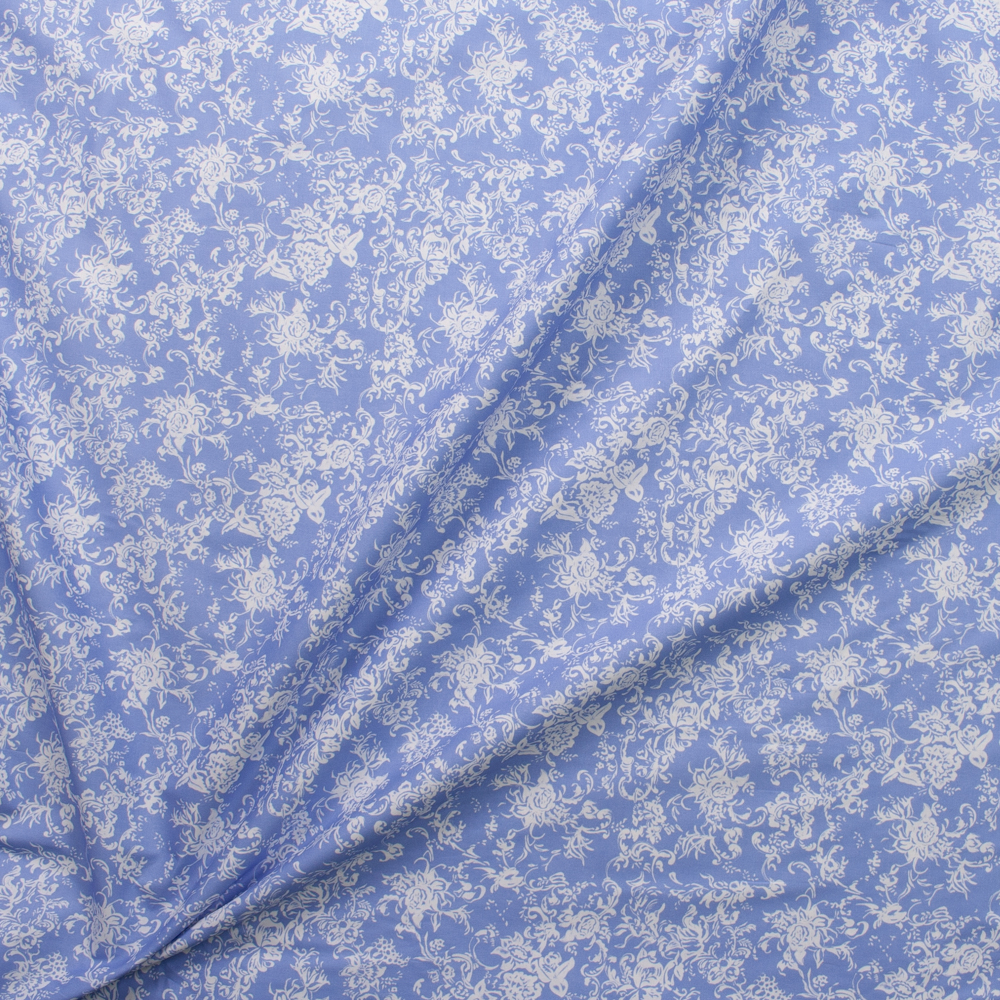 White Floral Scrollwork on Periwinkle Lightweight Stretch Cotton Sateen Fabric By The Yard - Wide shot