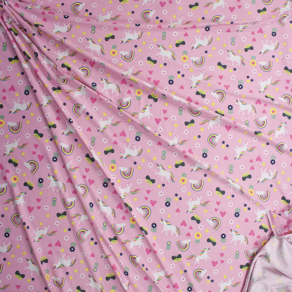 Unicorns, Rainbows, and Butterflies on Pink Double Brushed Poly/Spandex Fabric By The Yard - Wide shot