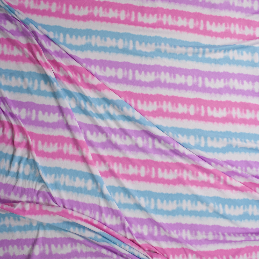 Pink, Blue, and Purple Tie Dye Stripe on White Double Brushed Poly/Spandex Fabric By The Yard - Wide shot