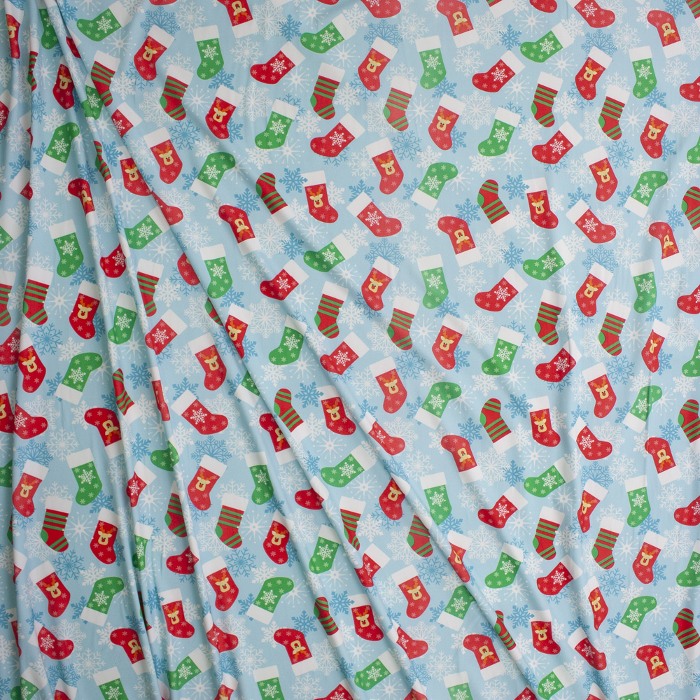 Christmas Stockings and Snowflakes on Light Blue Stretch Double Brushed Poly/Spandex Knit Fabric By The Yard - Wide shot