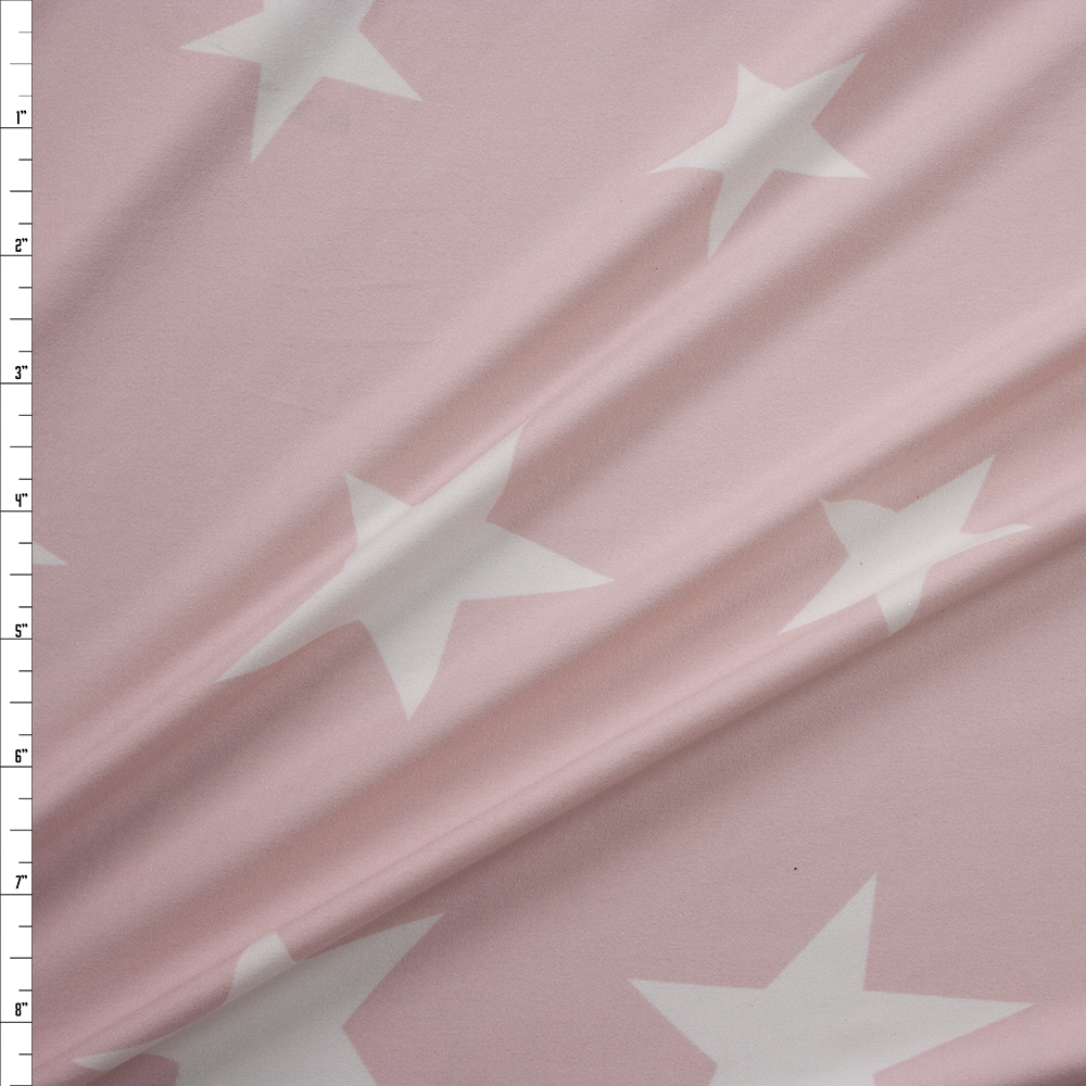 White Stars on Light Pink Stretch Double Brushed Poly/Spandex Knit Fabric By The Yard