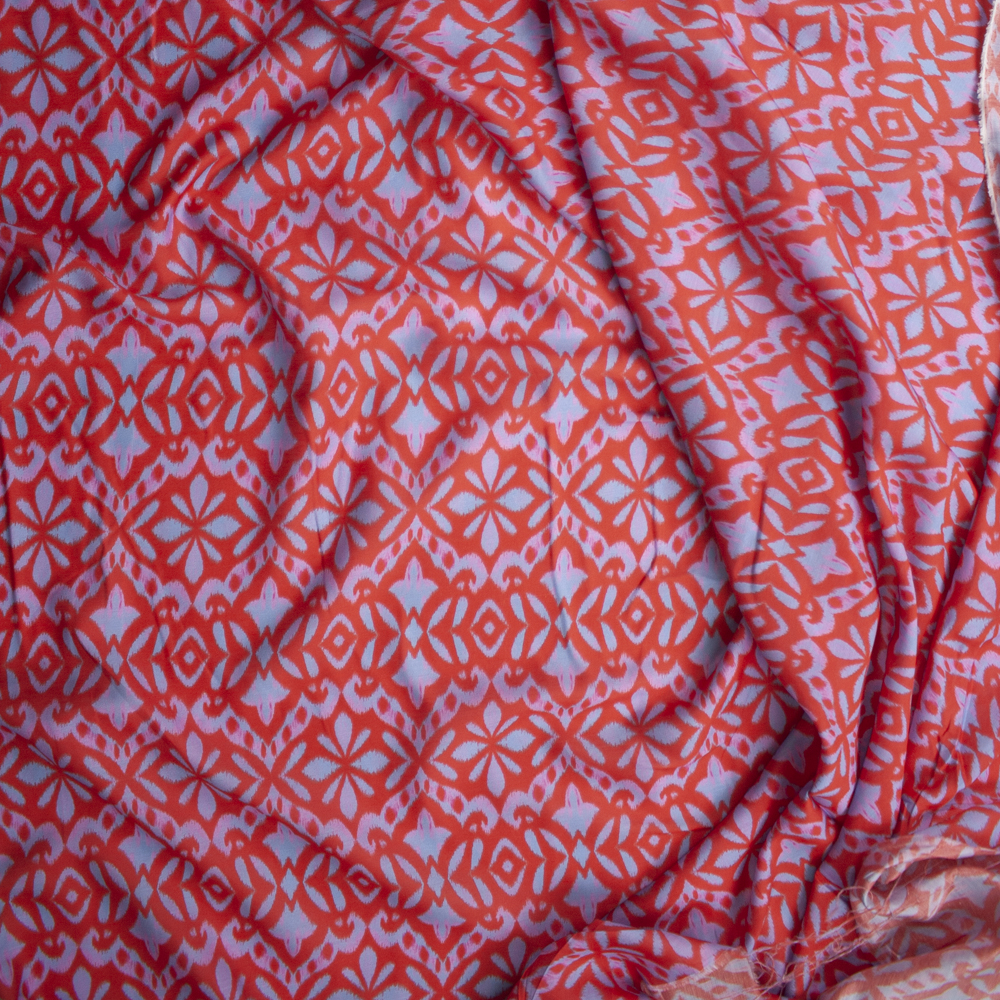Red, Light Blue, and Pink Ikat Cotton/Silk Voile Fabric By The Yard - Wide shot