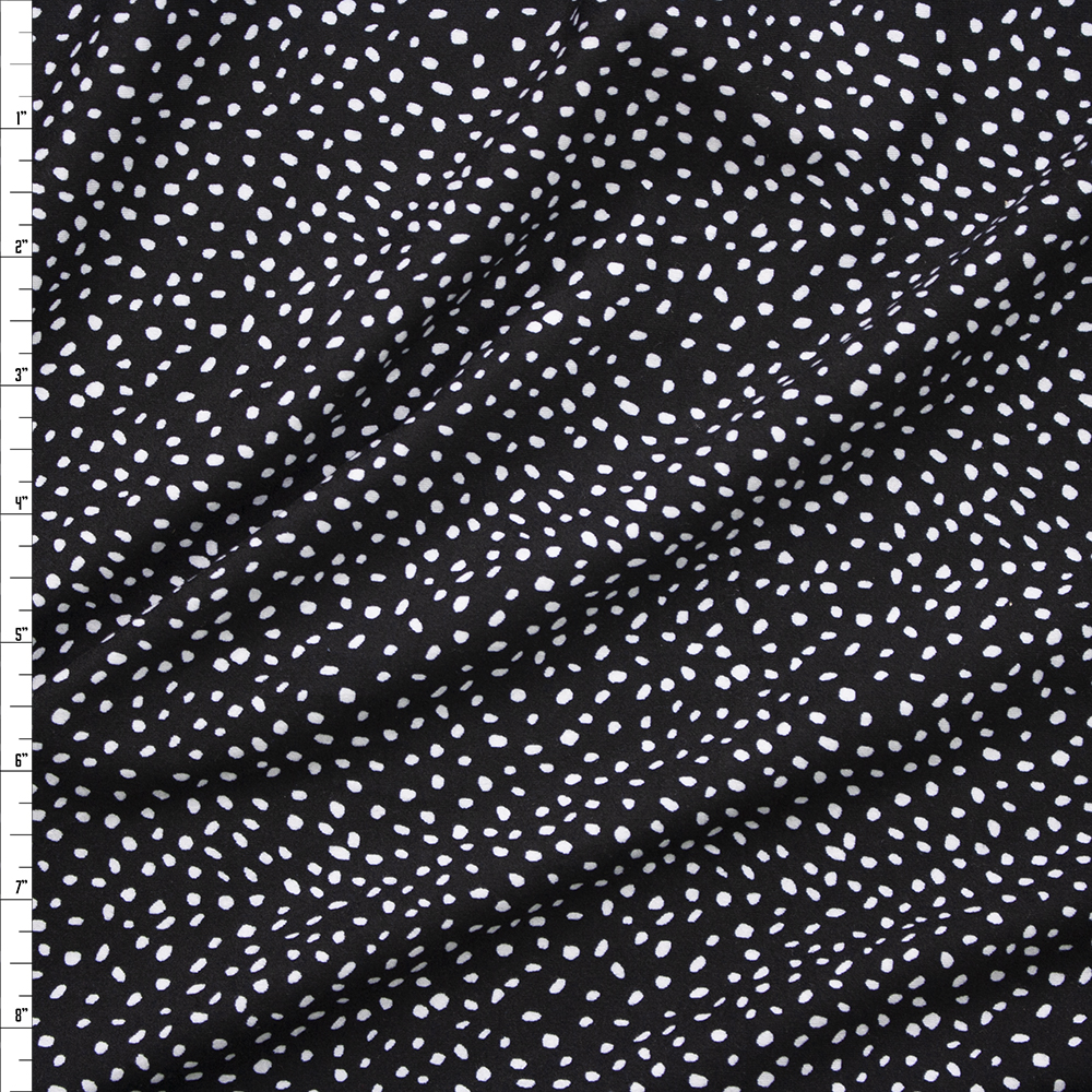 White Paint Dots on Black Double Brushed Poly/Spandex Knit Fabric By The Yard