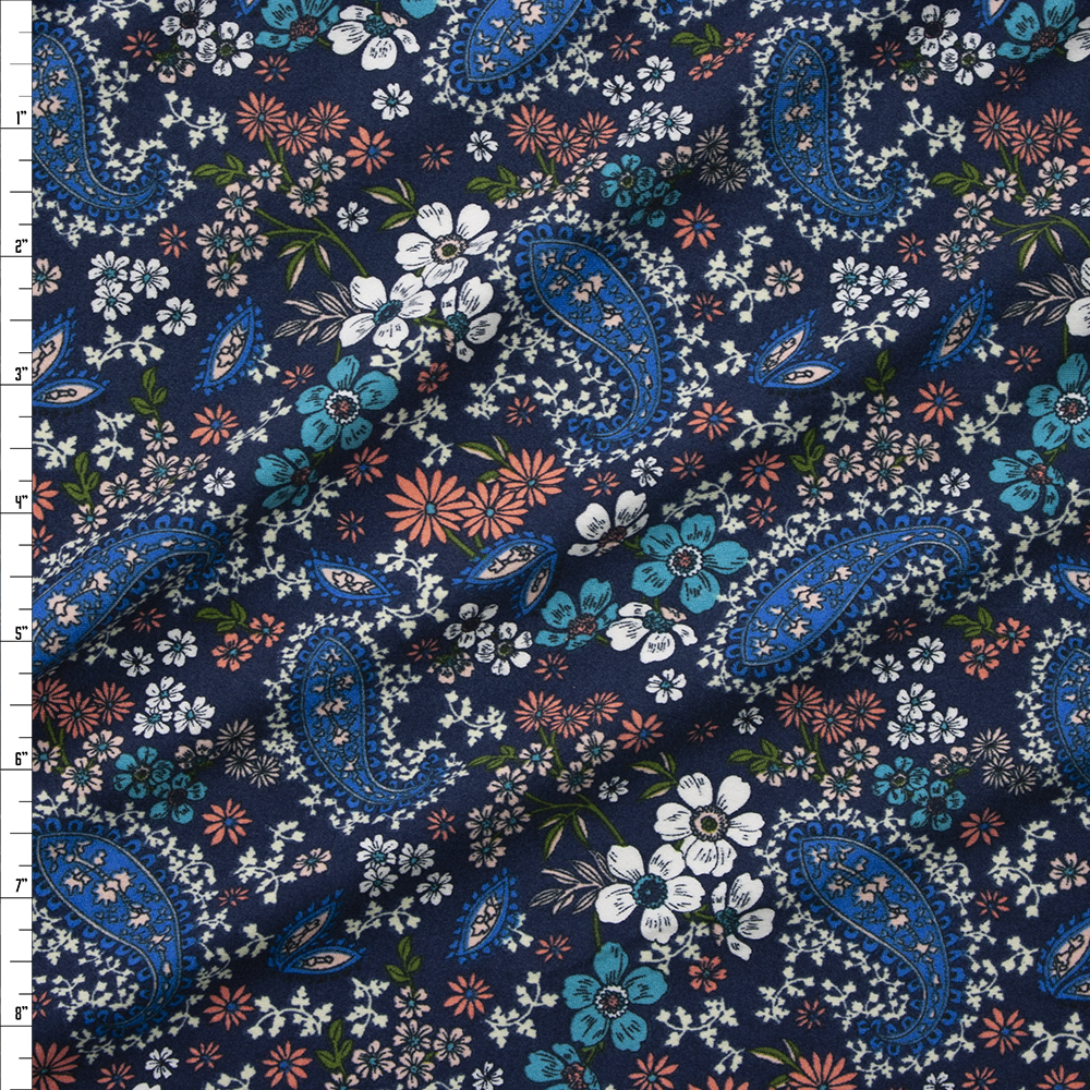 Blue, Ivory, Turquoise and Peach Paisleys on Navy Double Brushed Poly/Spandex Knit Fabric By The Yard