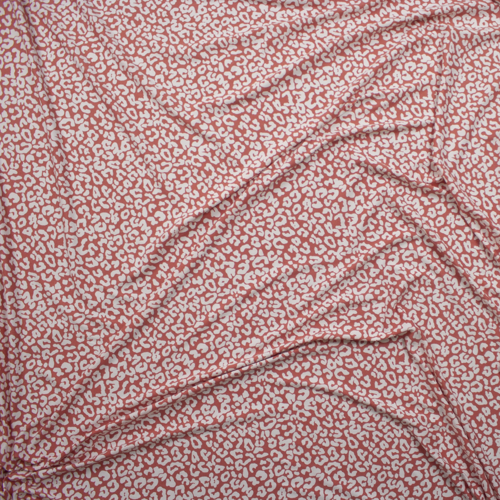 White Leopard Print on Dusty Pink Double Brushed Poly/Spandex Knit Fabric By The Yard - Wide shot