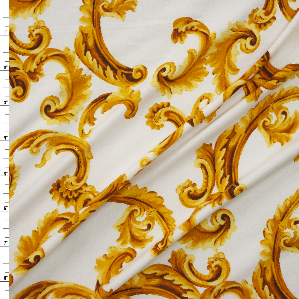 Golden Scrollwork on Ivory Double Brushed Poly/Spandex Knit Fabric By The Yard
