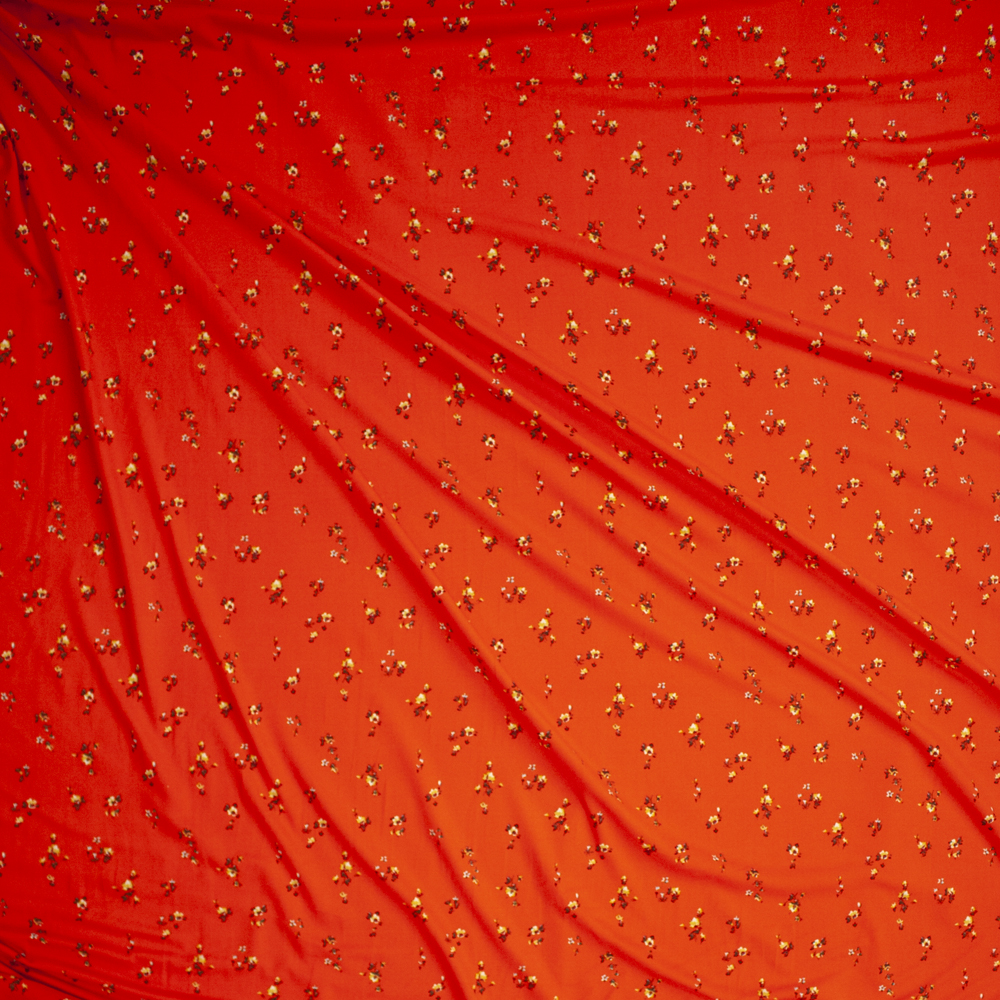 Mini Wildflower Clusters on Orange Double Brushed Poly/Spandex Knit Fabric By The Yard - Wide shot