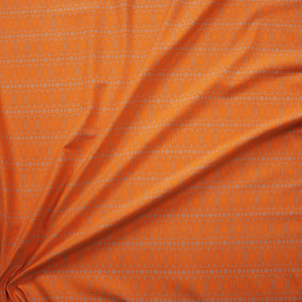 Orange and Tan Tired Scrollwork Nylon/Spandex Fabric By The Yard - Wide shot