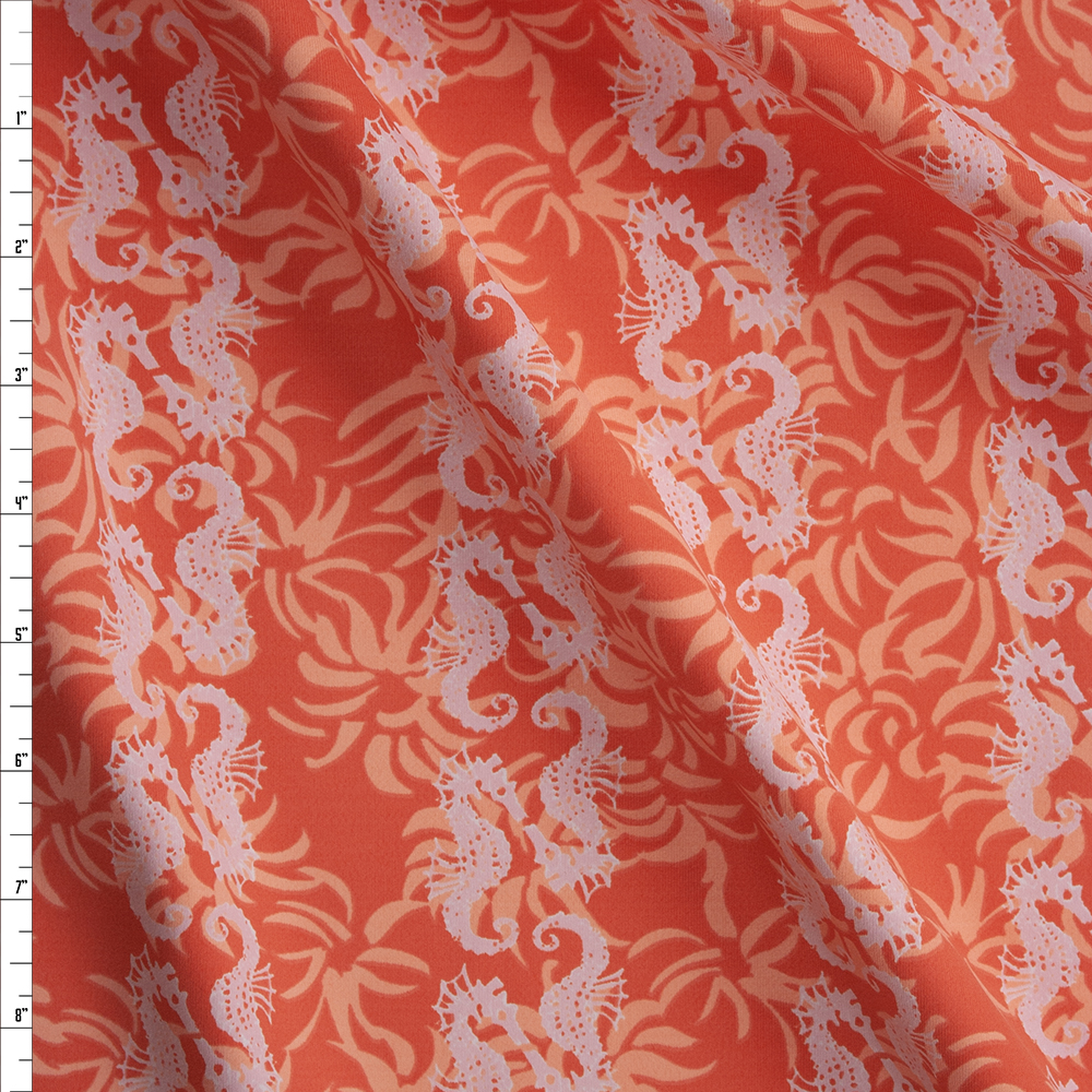Ivory Seahorses on Orange and Peach Sea Floral Nylon/Spandex Fabric By The Yard