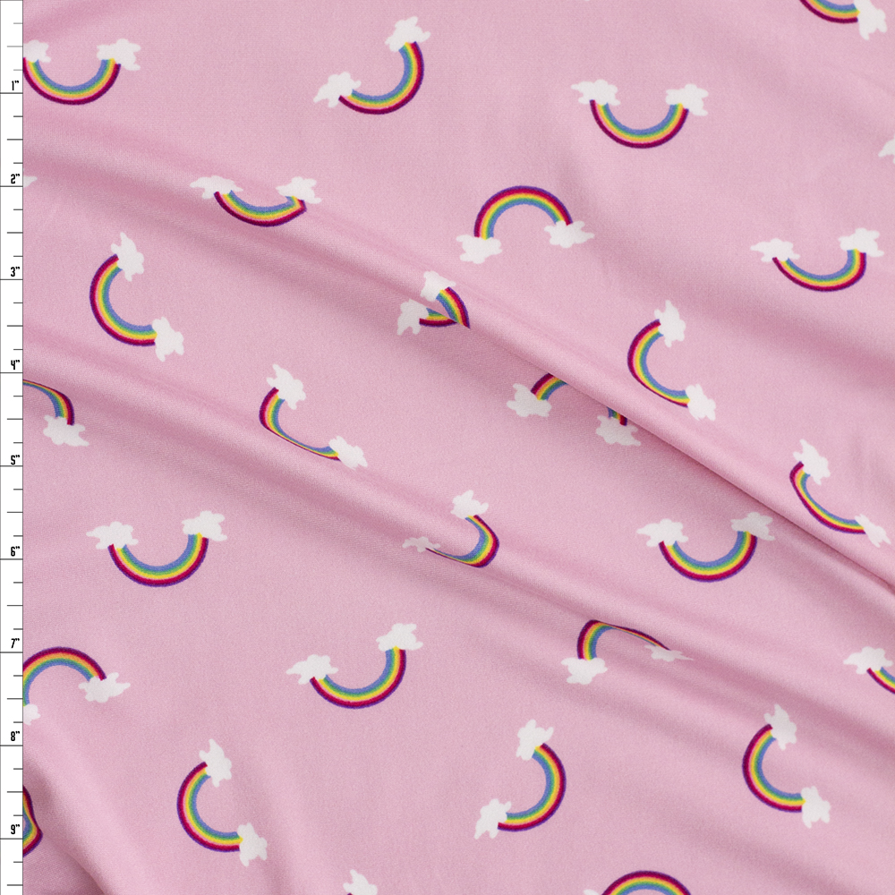 Rainbows on Pink Double Brushed Poly/Spandex Knit Fabric By The Yard