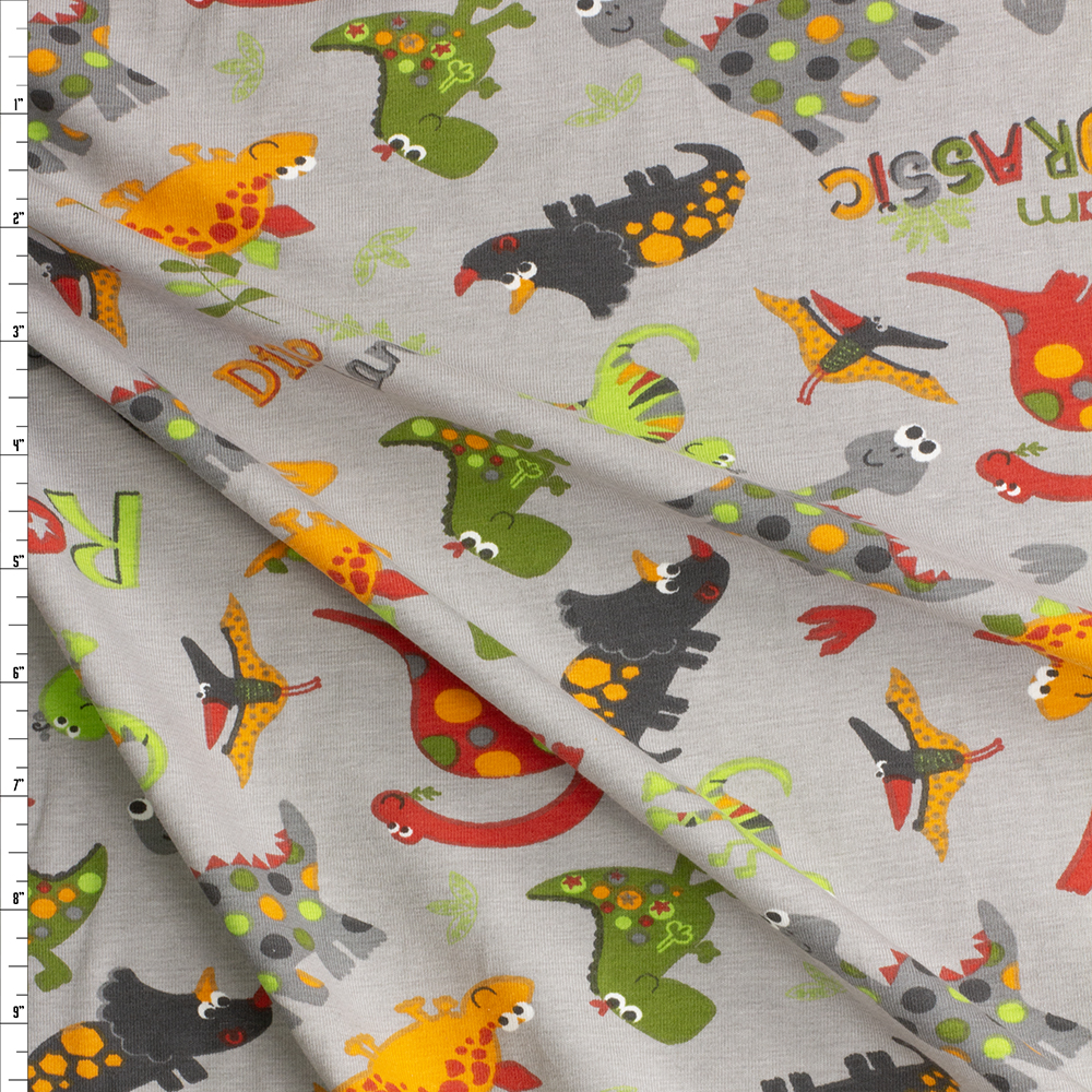 Friendly Dinos On Warm Grey Cotton/Spandex Jersey #28069 Fabric By The Yard