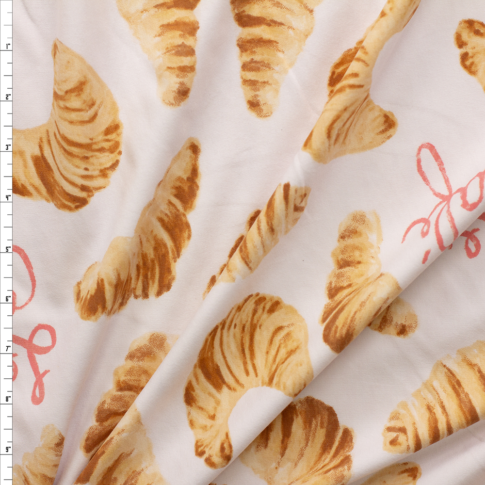 Le Cafe Croissants Non Blush Organic Cotton/Spandex Knit #28350 Fabric By The Yard - Wide shot