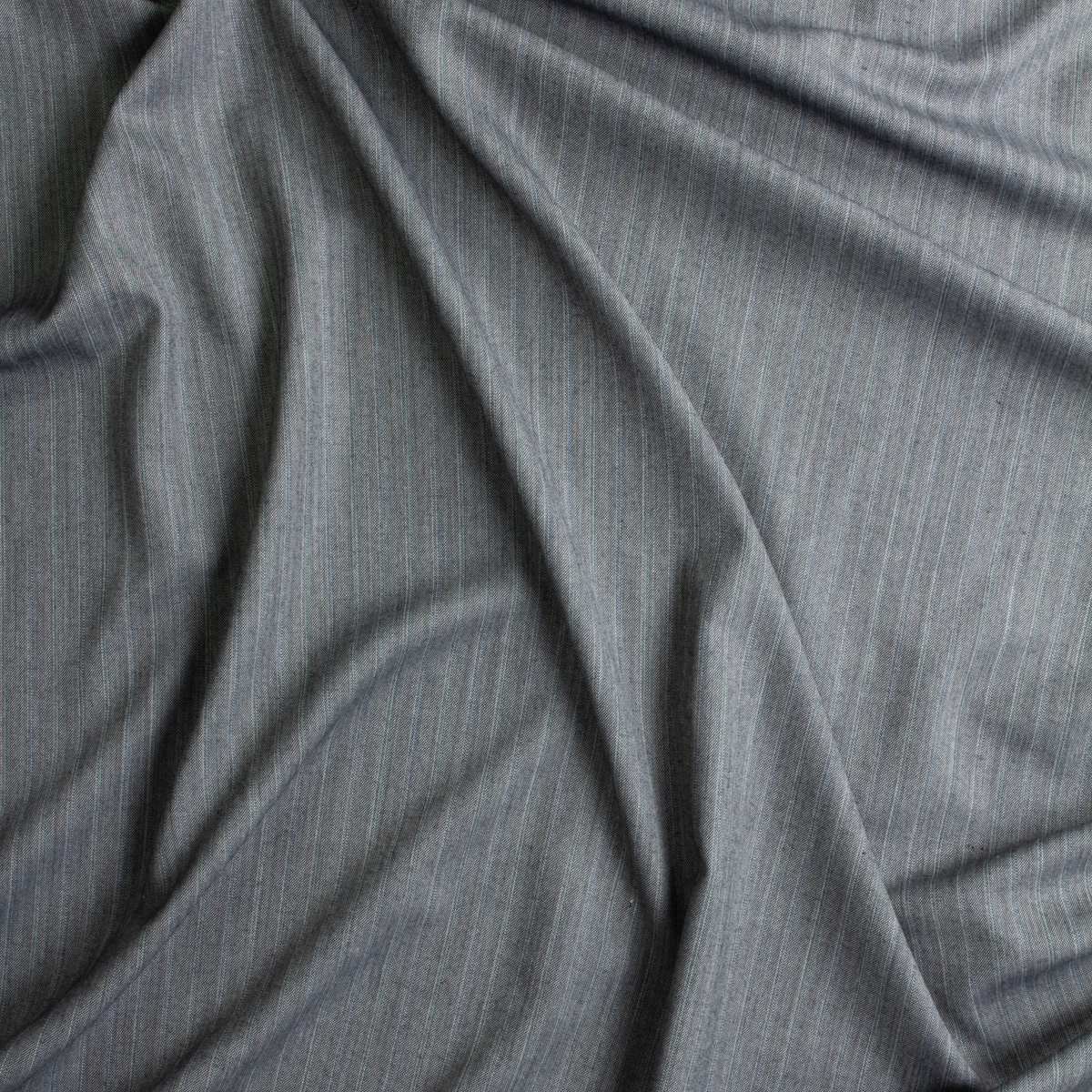 Charcoal With Green, Blue, And White Double Pinstripes Italian Wool Suiting #28781 Fabric By The Yard - Wide shot