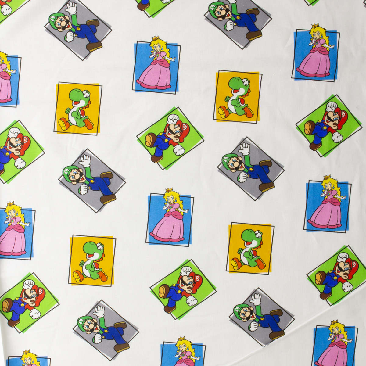 Mario and Friends Color Block Quilter’s Cotton from Maywood Studio #30468 Fabric By The Yard - Wide shot