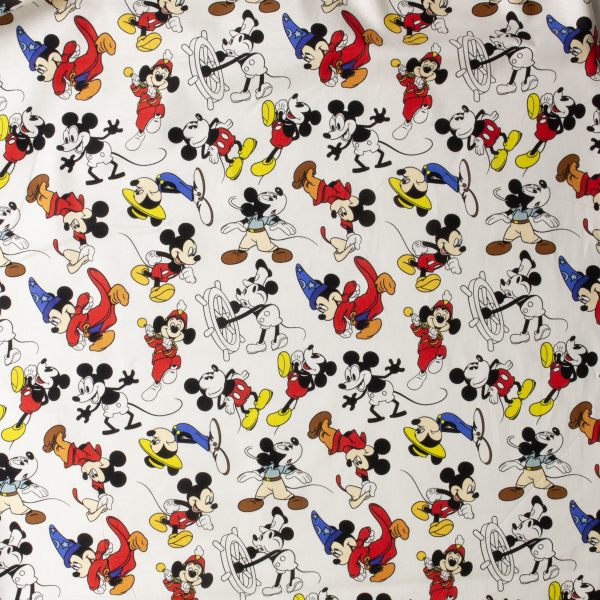 Mickey Through the Years Quilter’s Cotton from Maywood Studio #30469 Fabric By The Yard - Wide shot