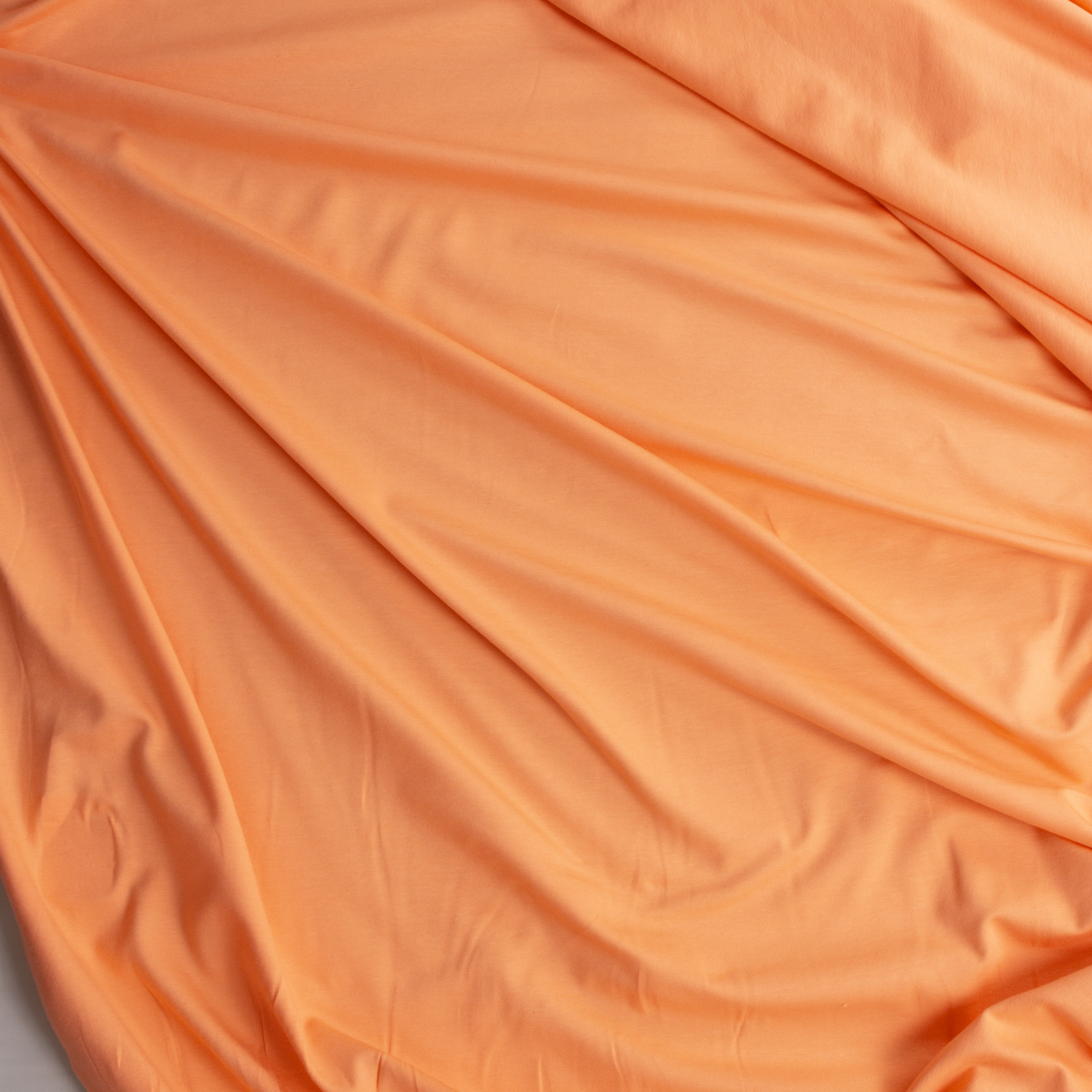 Coral Laguna Stretch Cotton Jersey Knit from Robert Kaufman #30546 Fabric By The Yard - Wide shot