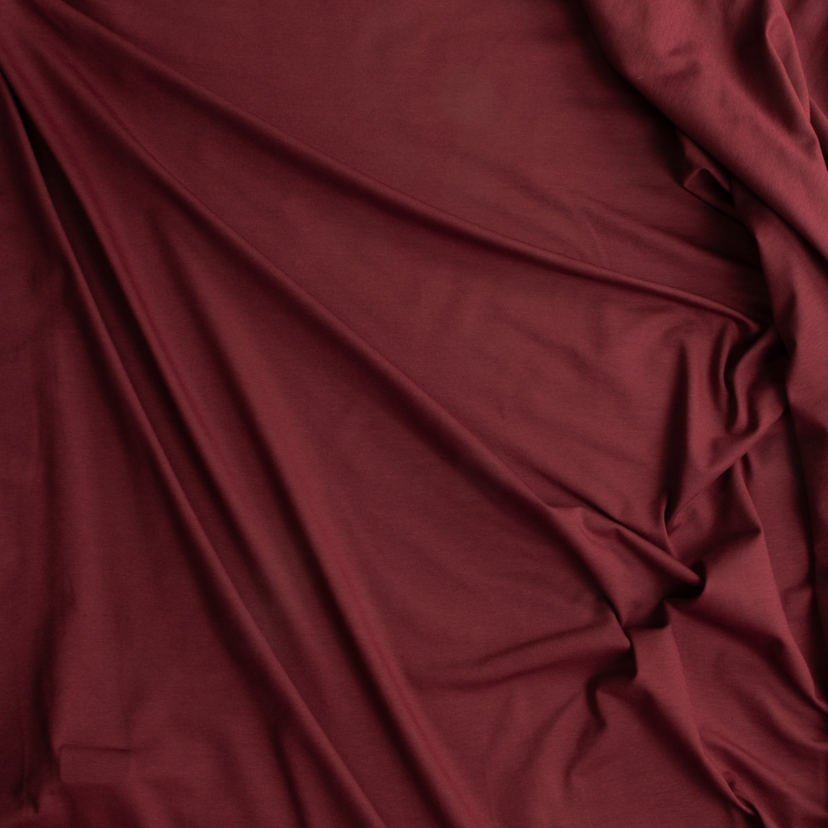Maroon Laguna Stretch Cotton Jersey Knit from Robert Kaufman #30548 Fabric By The Yard - Wide shot