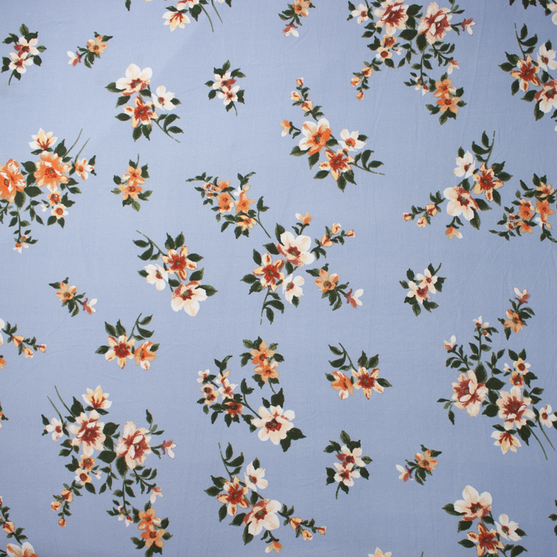 Orange and White on Light Blue Chalk Floral Double Brushed Poly Spandex Print Fabric By The Yard - Wide shot