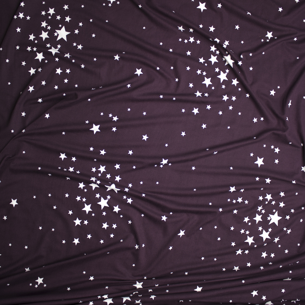 White Scattered Stars on Plum Double Brushed Poly Spandex Fabric By The Yard - Wide shot