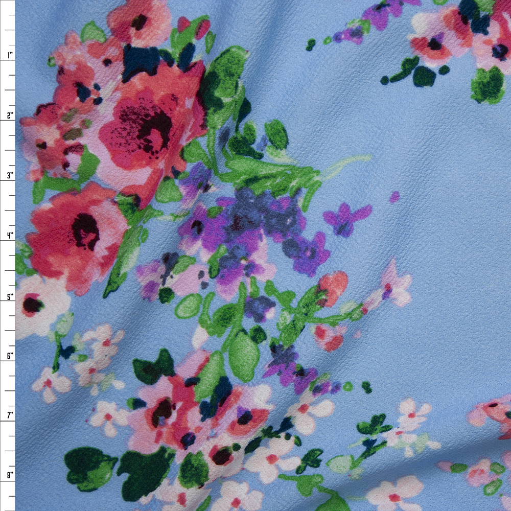 Pink, Purple, and White Watercolor Floral on Sky Blue Liverpool Knit Print Fabric By The Yard