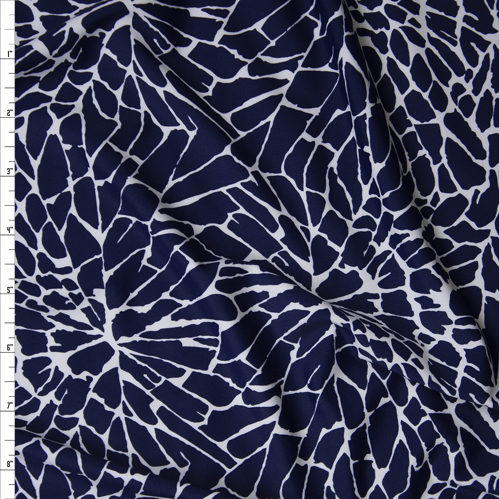White on Navy Shattered Glass Print Nylon/Spandex Print Fabric By The Yard