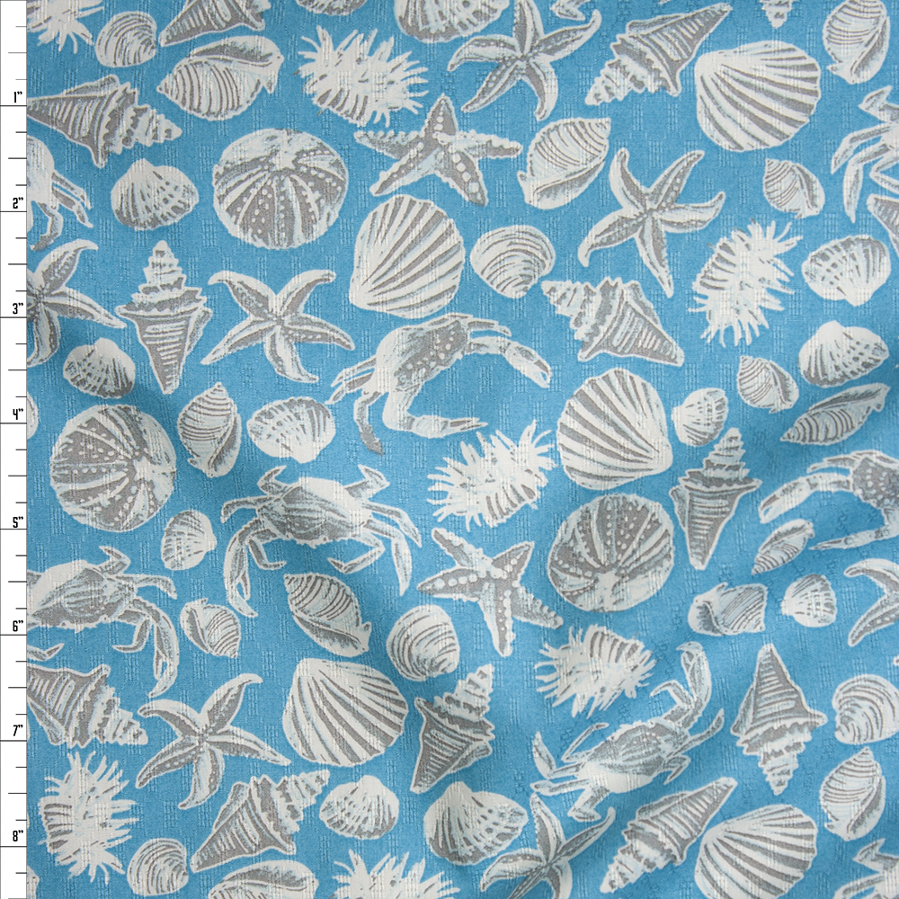 Tan and Ivory Seashells on Turquoise Fine Cotton Jacquard from ‘Tori Richards’ Fabric By The Yard