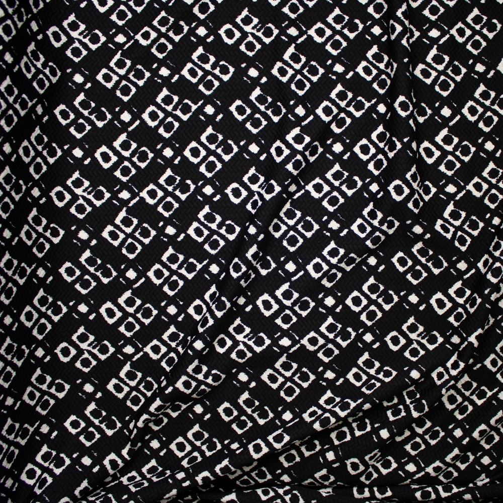White Grunge Diamond Pattern on Black Brick Textured Double Knit Fabric By The Yard - Wide shot