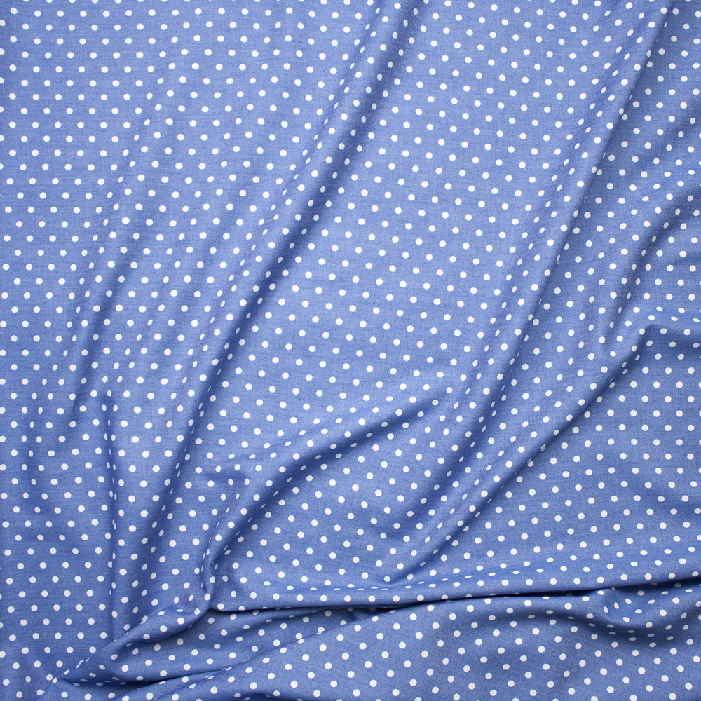 White Polka Dots on Light Blue Tencel Chambray Fabric By The Yard - Wide shot